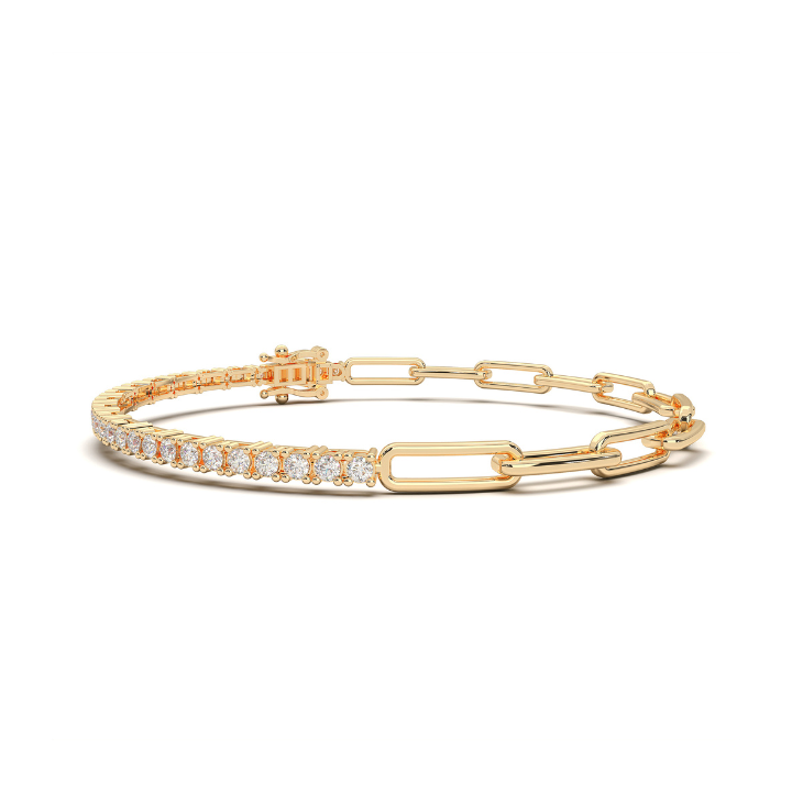 Christmas 2024 gift ideas for style mavens, rock rush yellow gold paper clip x tennis bracelet